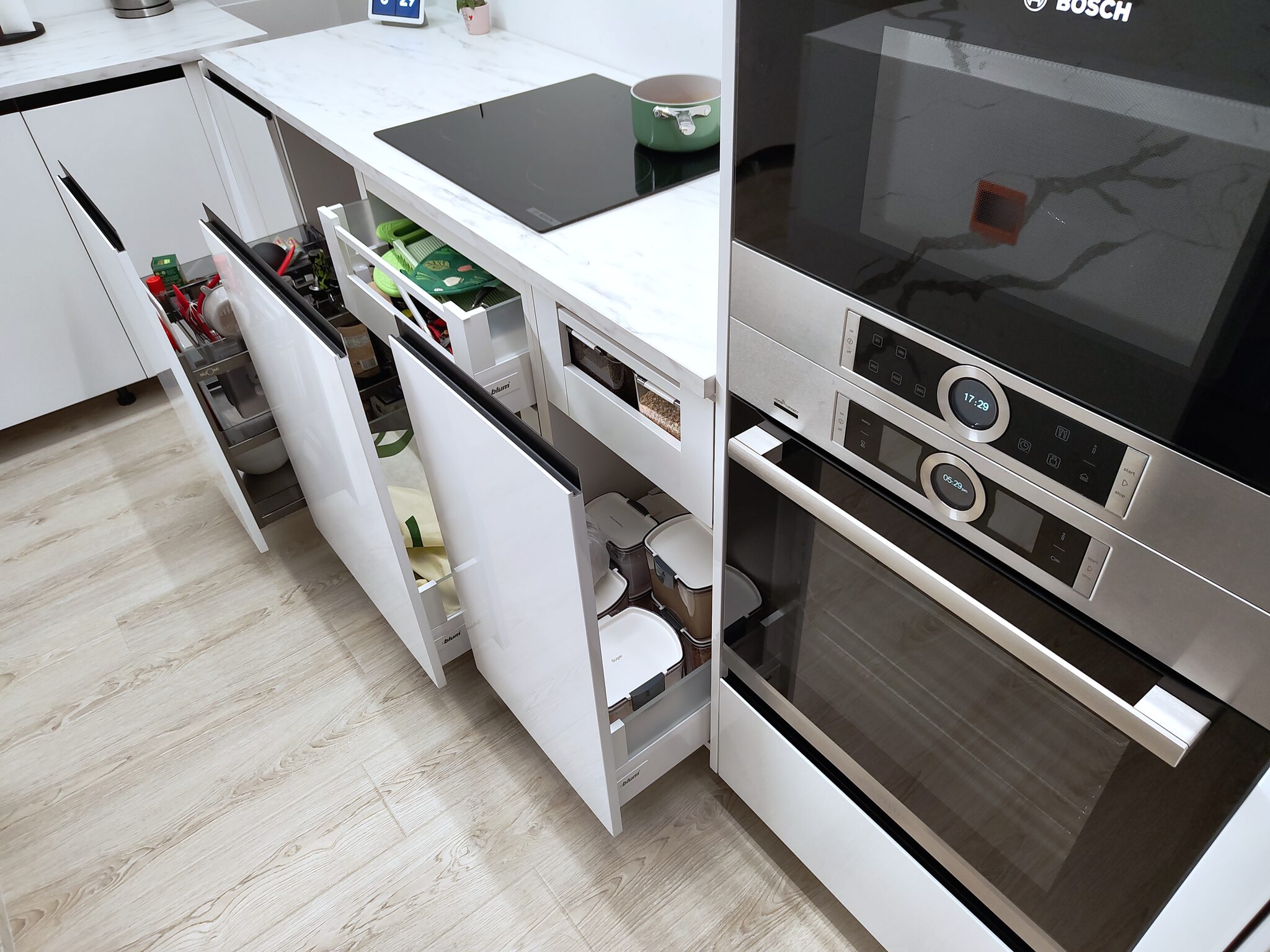 Bosch wall ovens and pull-out cabinet storage