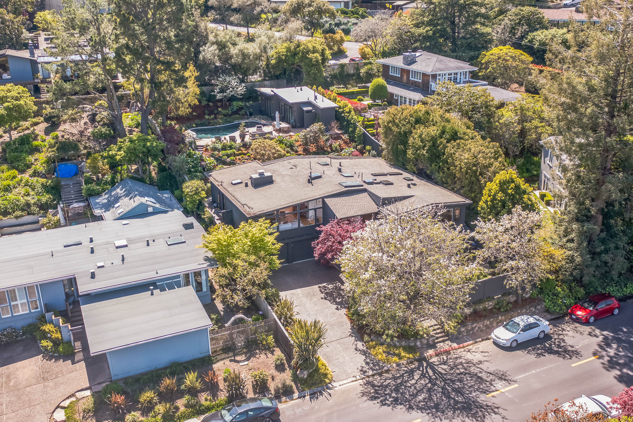 Aerial of the house, pool, and ADU