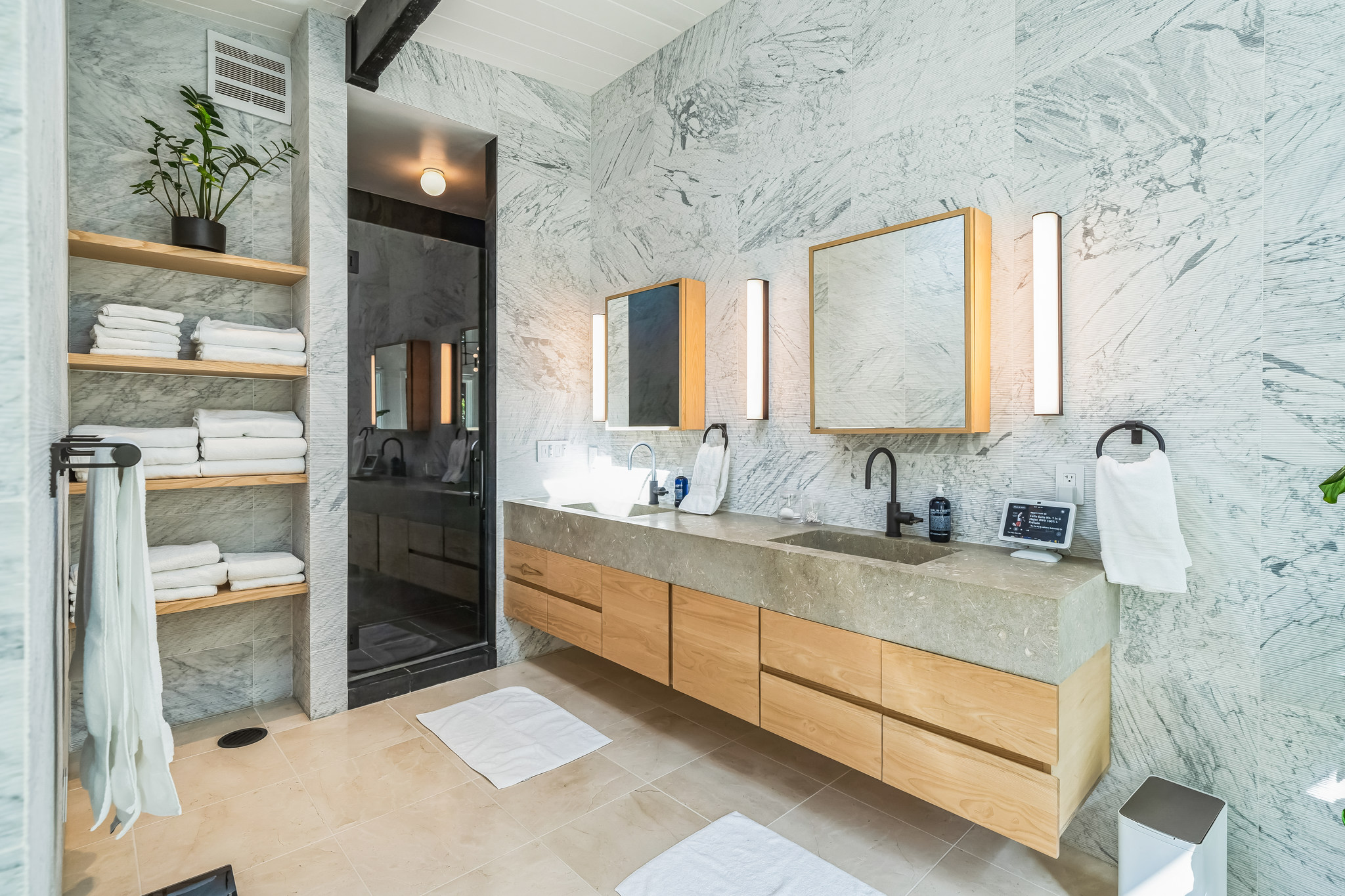 Primary vanity and linen shelves